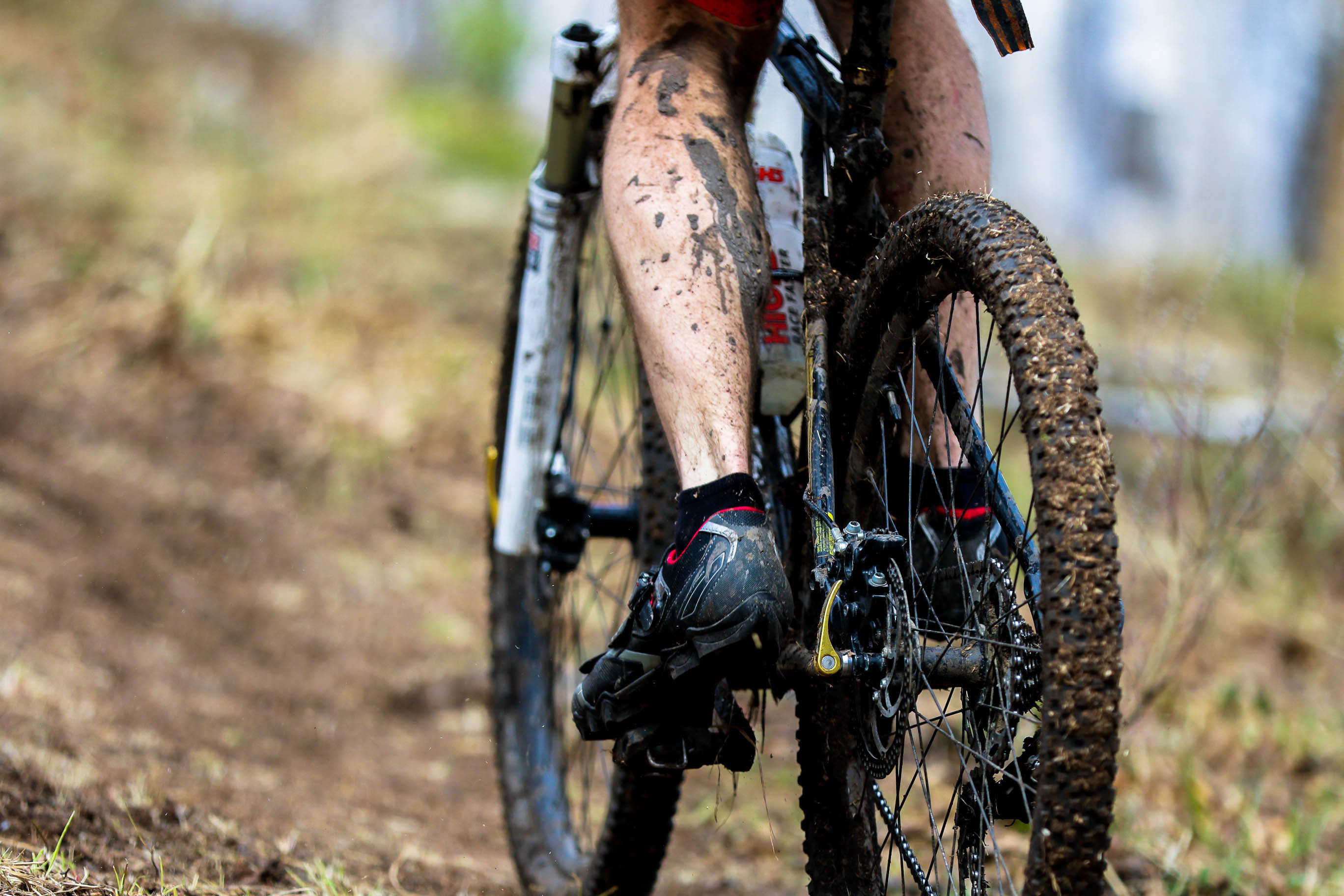 Muddy bike rider